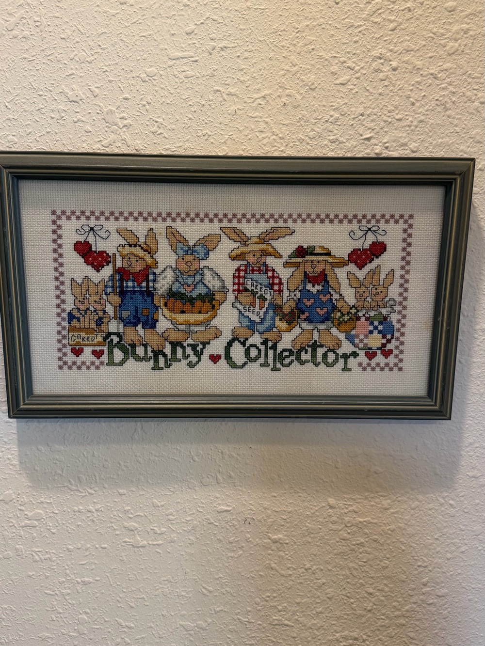 Vtg Handmade “Bunny Collector” Framed Cross Stitch  14” x 8” Cottagecore